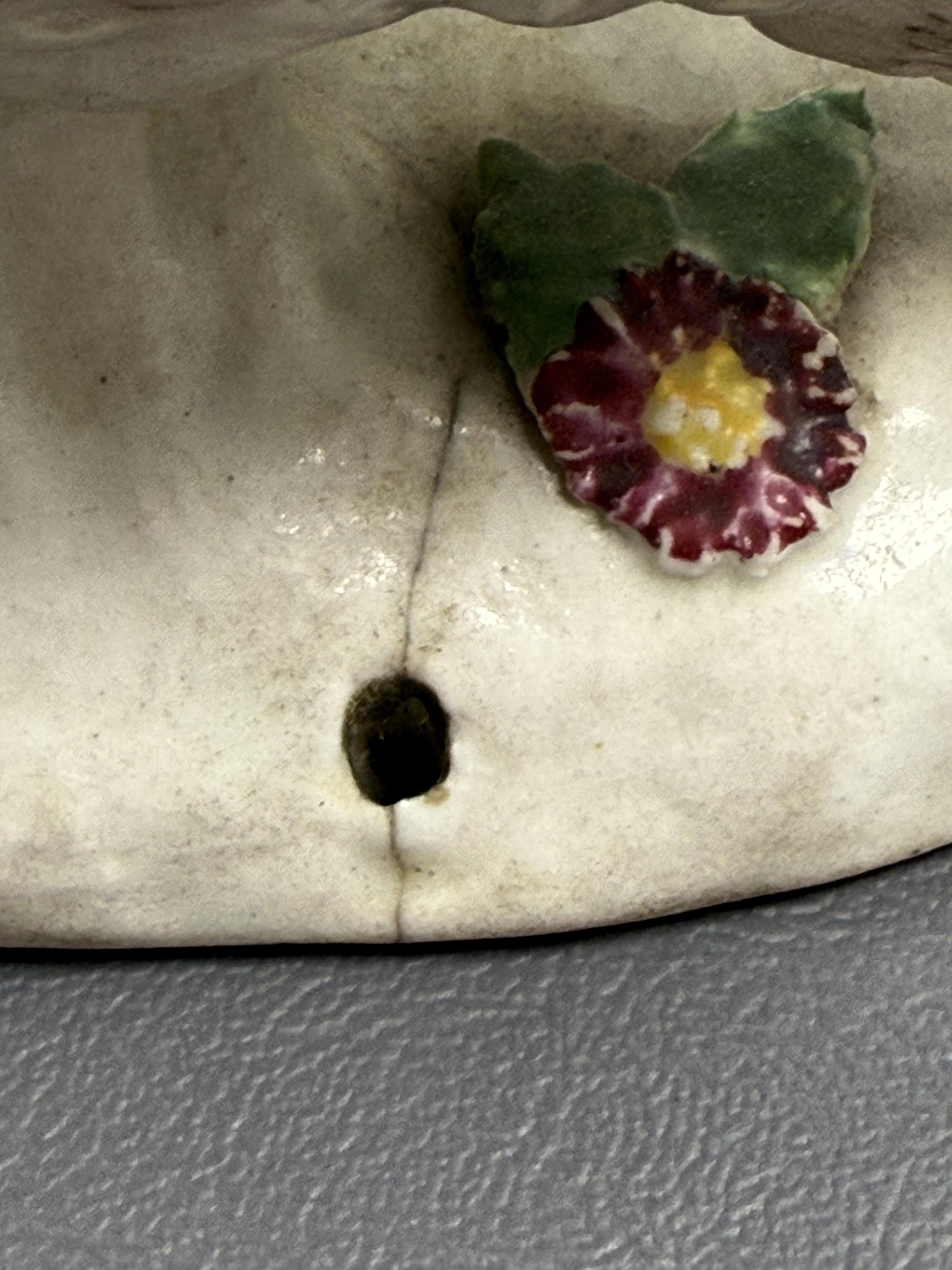 A pair of early Derby porcelain models of wild boars, c.1752-55